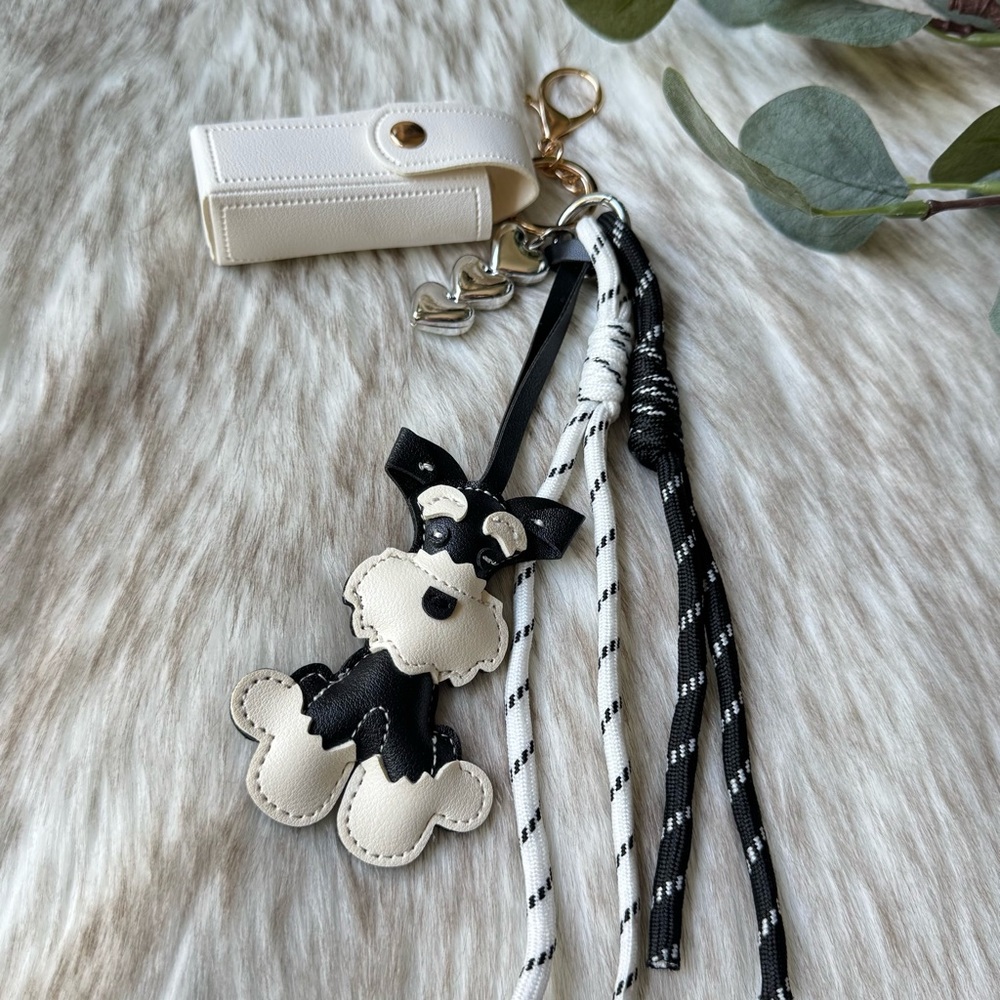 Black and White Dog Keychain with Cream Holder